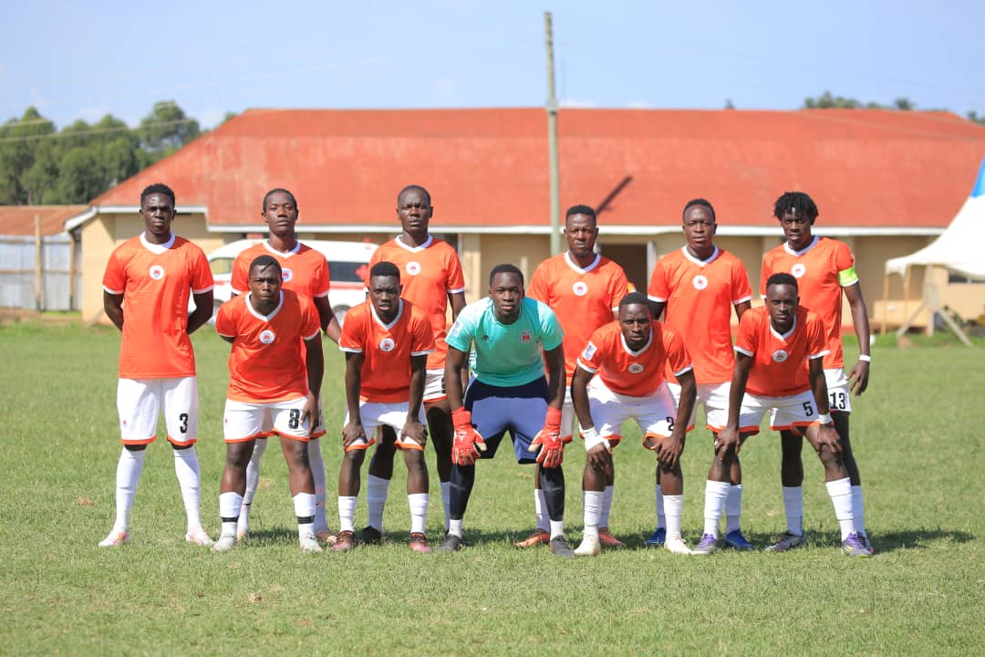 Players contest a decision in a FUFA Big League match